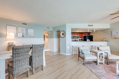 Relax in this inviting open-concept space featuring cozy coastal decor, a granite breakfast bar, and charming beach-inspired touches throughout. The layout is perfect for gathering with family or enjoying a quiet morning with coffee.