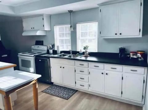 Full kitchen with cooking supplies