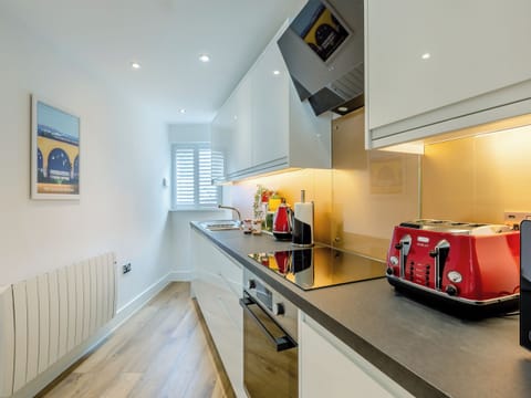 Kitchen | Belgrave Sands Apartment, Torquay Seafront