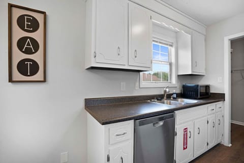 Kitchen equipped with all materials needed to cook a full meal. Complimentary bottled water is available