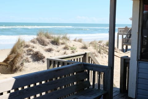 View from the deck.

Sand is common in the area, including under the house, on walkways, deck, patio, porch and street.