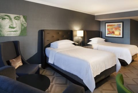Drift off easily in perfectly made beds with plush pillows.