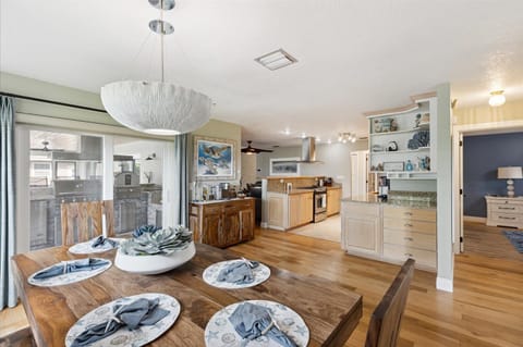 A charming dining space that connects to the kitchen and lanai for effortless entertaining.