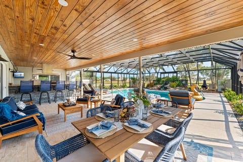 Unwind in a spacious poolside lounge, the perfect spot for cocktails, relaxation, and soaking up the sun