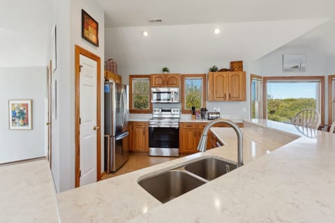 Whip up something delicious in the Kitchen with plenty of prep space.