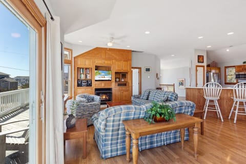 Relax in the spacious Top-Level Living Area! (Please note: Fireplace is not for guest use.)