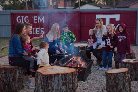 Our backyard escape with fire pit. S’mores skewers provided.