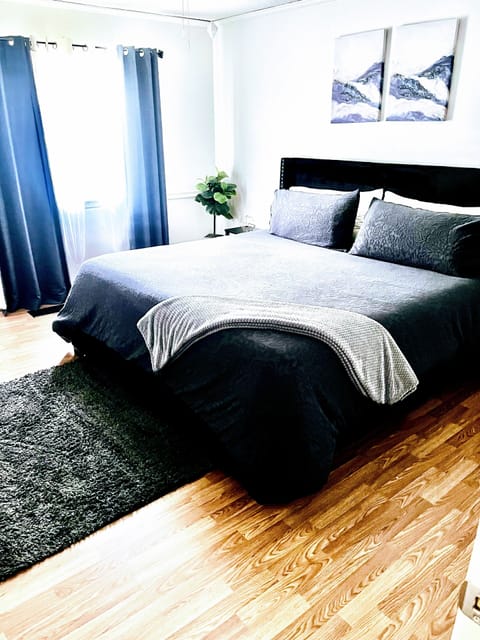 King Room with ceiling fan ,cloud mattress, walk-in closet + blackout curtains.