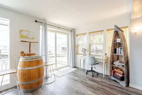 Work or play. Bar top wine barrell, games and books available, or a small desk for those who need to work