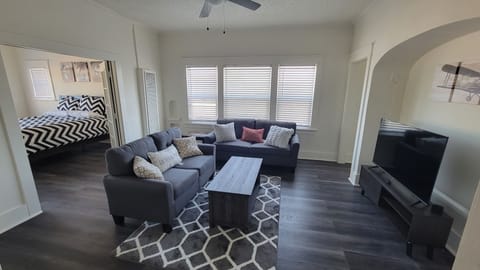 main common area with Bedroom 1 door open