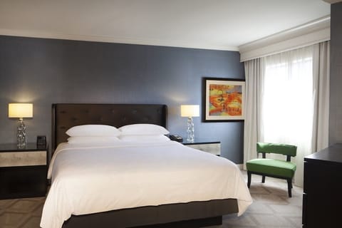 Drift into deep sleep in a sunlit, hotel-luxe bed.