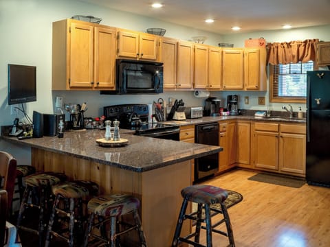 Yes 4 bar stools by our beautiful countertop plus a laptop monitor and / or TV!