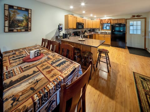 We have a large sized dining room table and chairs for eight guests!