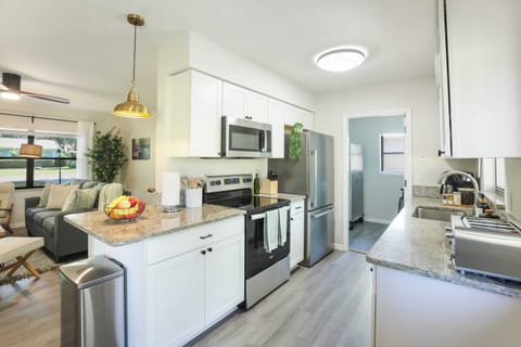 Enjoy family dinners and intimate gatherings in our chic dining space, adorned with modern accents