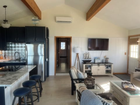 Open concept great room with vaulted ceilings.  Comfortable living and entertain