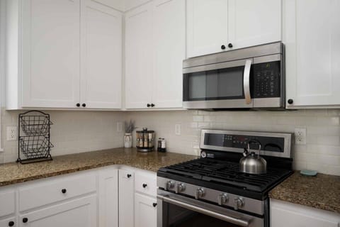 The kitchen has ample counter space and up to date appliances.