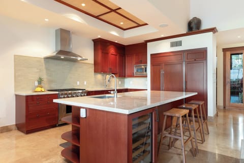 Expansive kitchen island with additional seating and Wine Chiller
