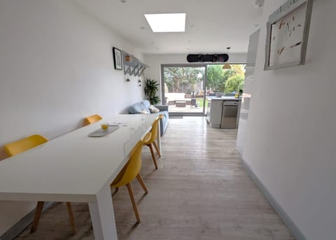 Open plan living space with garden views