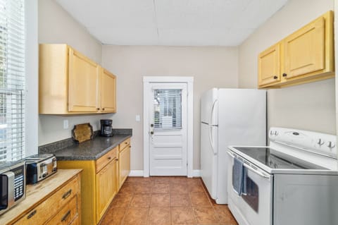 Modern appliances and granite counters make cooking feel effortless.