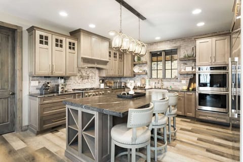 The Well Stocked Kitchen Includes Stainless Appliances and Large Center Island