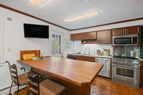 Full kitchen with gas range, dishwasher, microwave, coffee maker, fridge, etc.