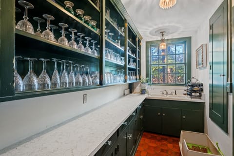 Pantry between kitchen and dining room.