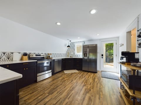 The kitchen features all the appliances and cookware you need to prepare meals