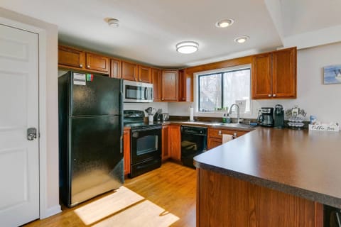 Well stocked kitchen, open to dining and living areas