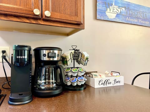 Drip and Keurig coffee makers, selection of tea, decaf and regular pods