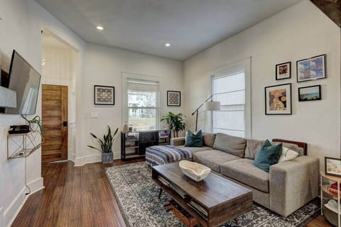 Comfy living room with big windows for natural light