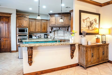 Experience joy in a kitchen where elegance meets practicality.
