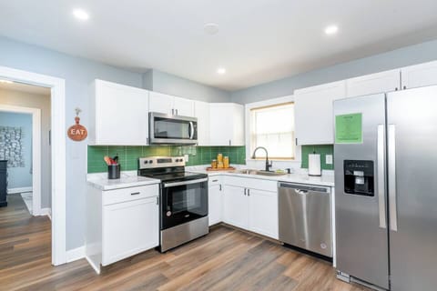 Open kitchen with stainless appliances