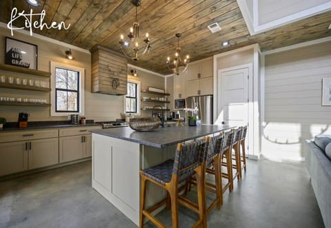 Our sleek, spacious kitchen is where you can cook up memories, laughter, and maybe even some pancakes