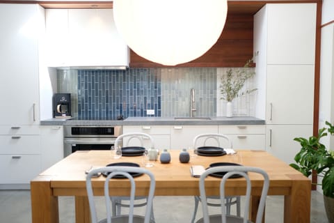 Enjoy a meal with the large dining table and full kitchen