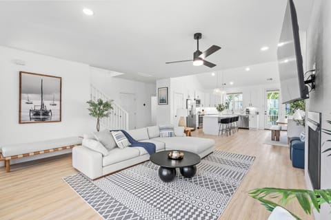 Main Living Room w/Large TV + Fireplace (2nd Floor)