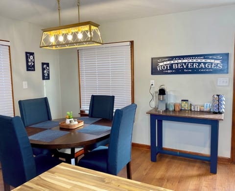 Seating for 4 guests, "Hot Beverage" bar with complimentary coffee and tea