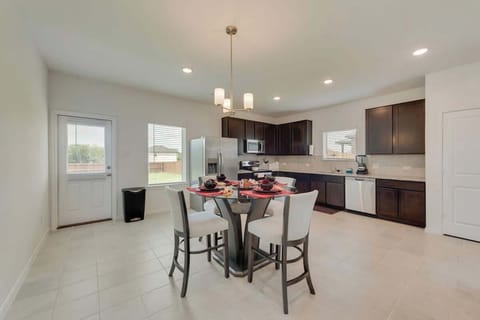 Full Kitchen Cooking basics Dishwasher Hot water kettle Microwave Oven Refrigerator Stove Baking sheet Blender Coffee maker Dishes and silverware Freezer Rice maker Toaster Wine glasses Trash compactor