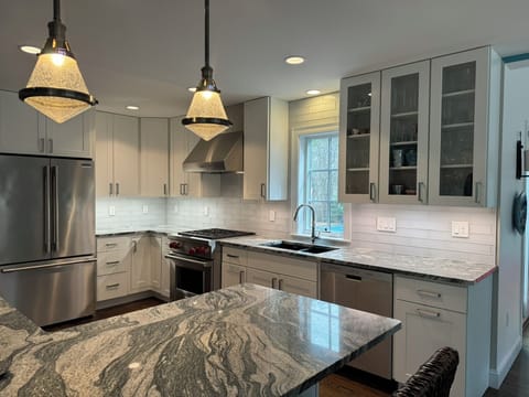 New kitchen with Wolf stove/oven, dishwasher, fridge-freezer with H20/ice