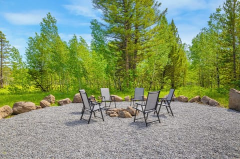 Outdoor fire pit located off the back deck