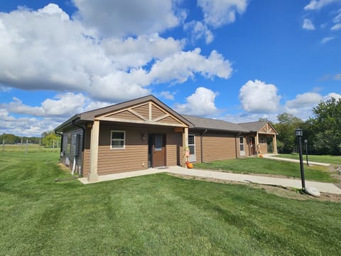 Legacy Cabin 2 entrance, on the left, and adjoining unit Legacy Cabin 1, to the right. The units are private with an interior security door separating them.