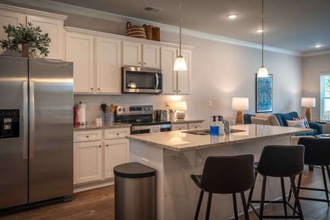 A fully equipped kitchen with everything you need for preparing delicious meals... even a crock pot.