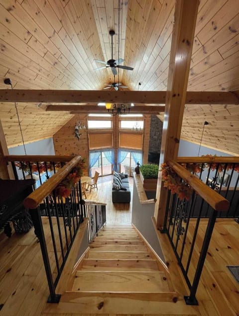 Spectacular rustic loft area with panoramic views of the home and lake