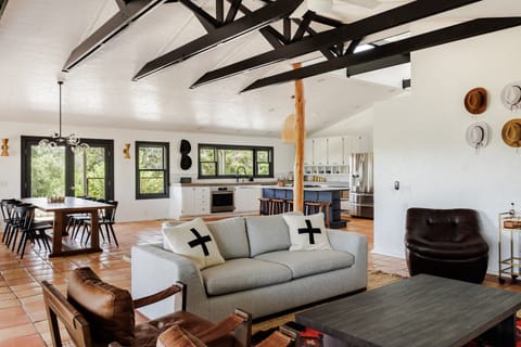 Contemporary furnishings including a queen size sleeper sofa