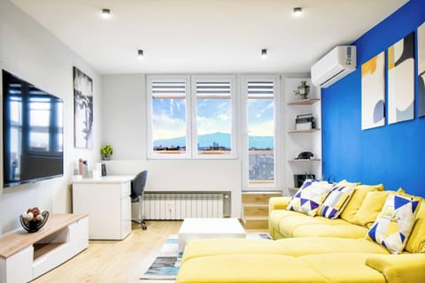 Unwind in style! Our living room blends modern design with homey comfort, complete with an extendable sofa-bed. Ideal for family stays. Feel free to message us for more details!