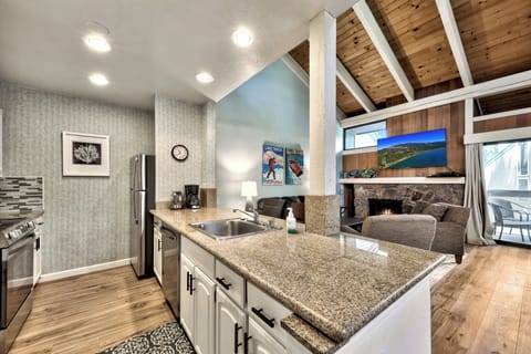 The remodeled kitchen with large granite countertops is a chefs dream