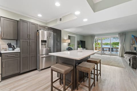 Open floor plan provides river view from kitchen