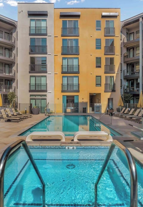 Relax and unwind in the communal swimming pool, ideal for guests of all ages.