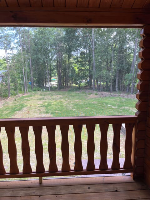 View off of the screened in porch down to water access for kayak entry