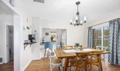 Dining room with additional table & chairs for 14 guests