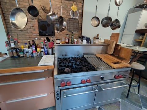kitchen with 6 burner wolf range and double oven